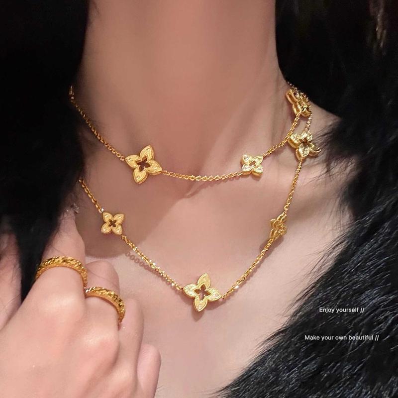 18K真金电镀轻奢锆石条纹菱形镂空花朵项…